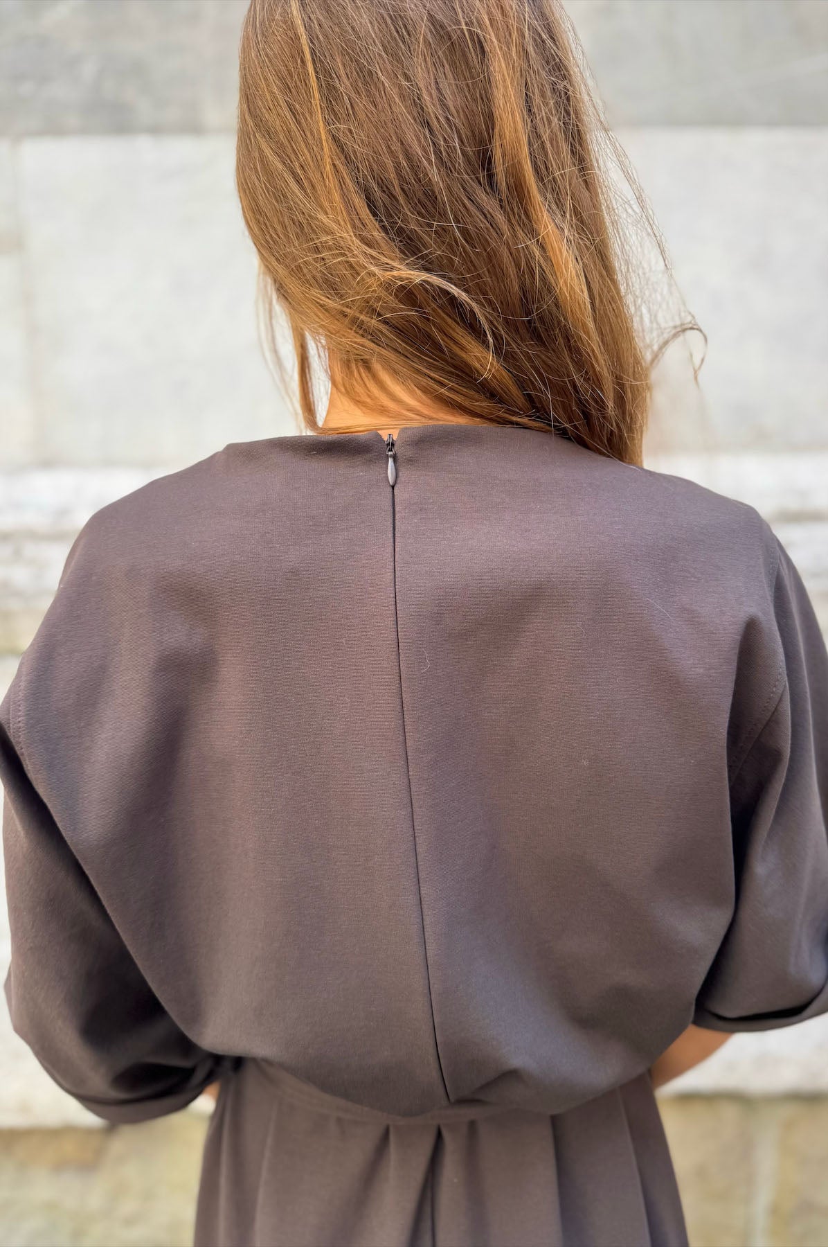 Tuta palazzo con cintura