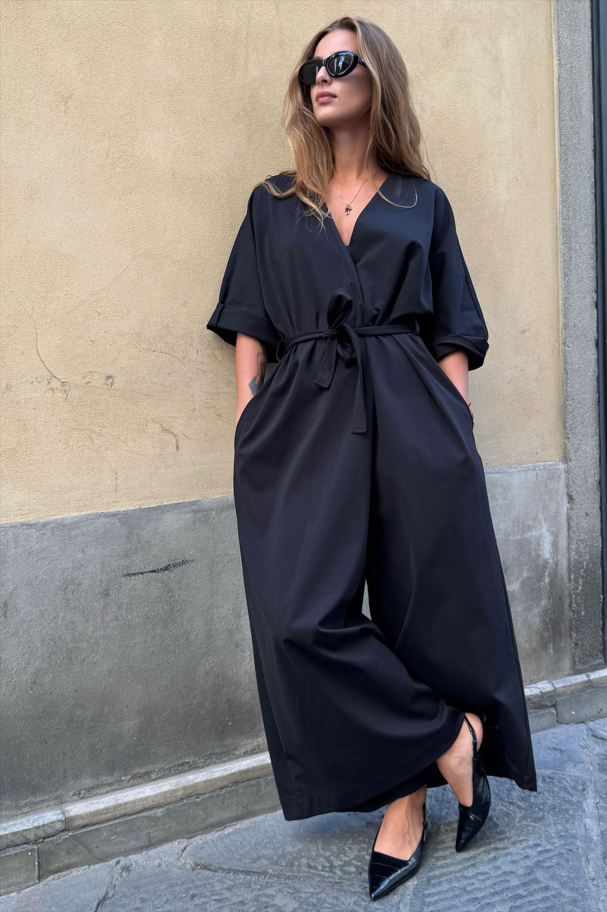 Tuta palazzo con cintura