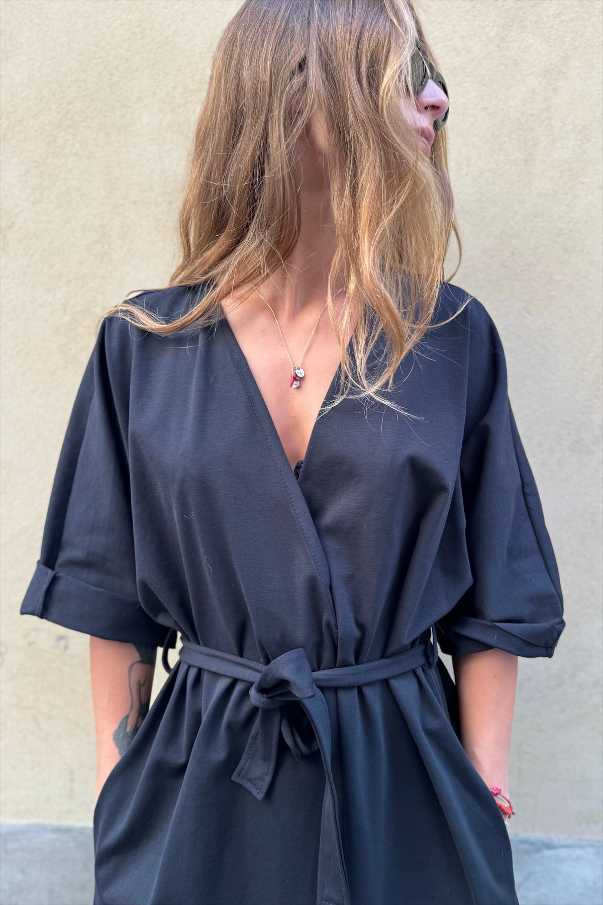 Tuta palazzo con cintura