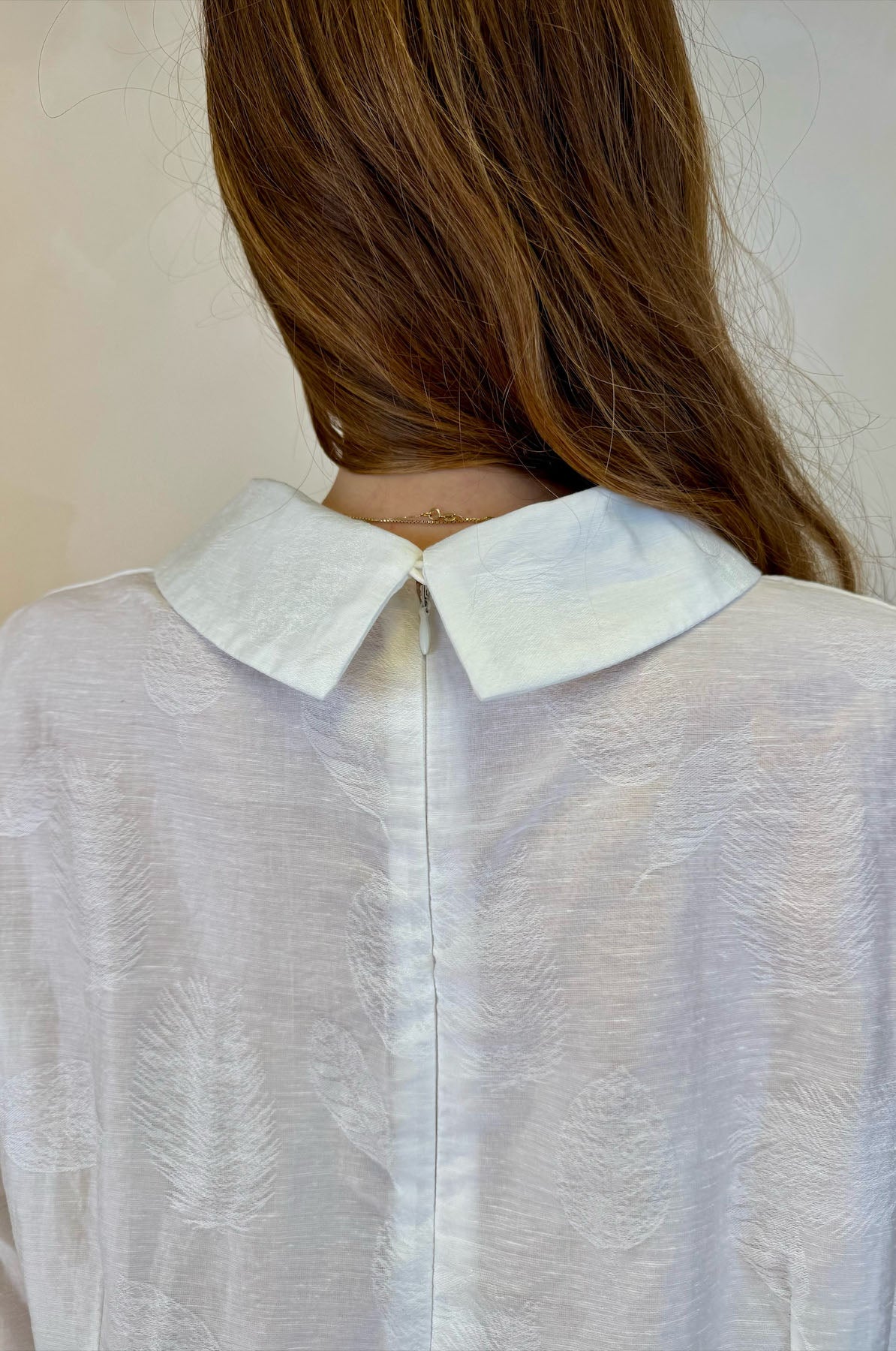 Blusa con motivo applicato