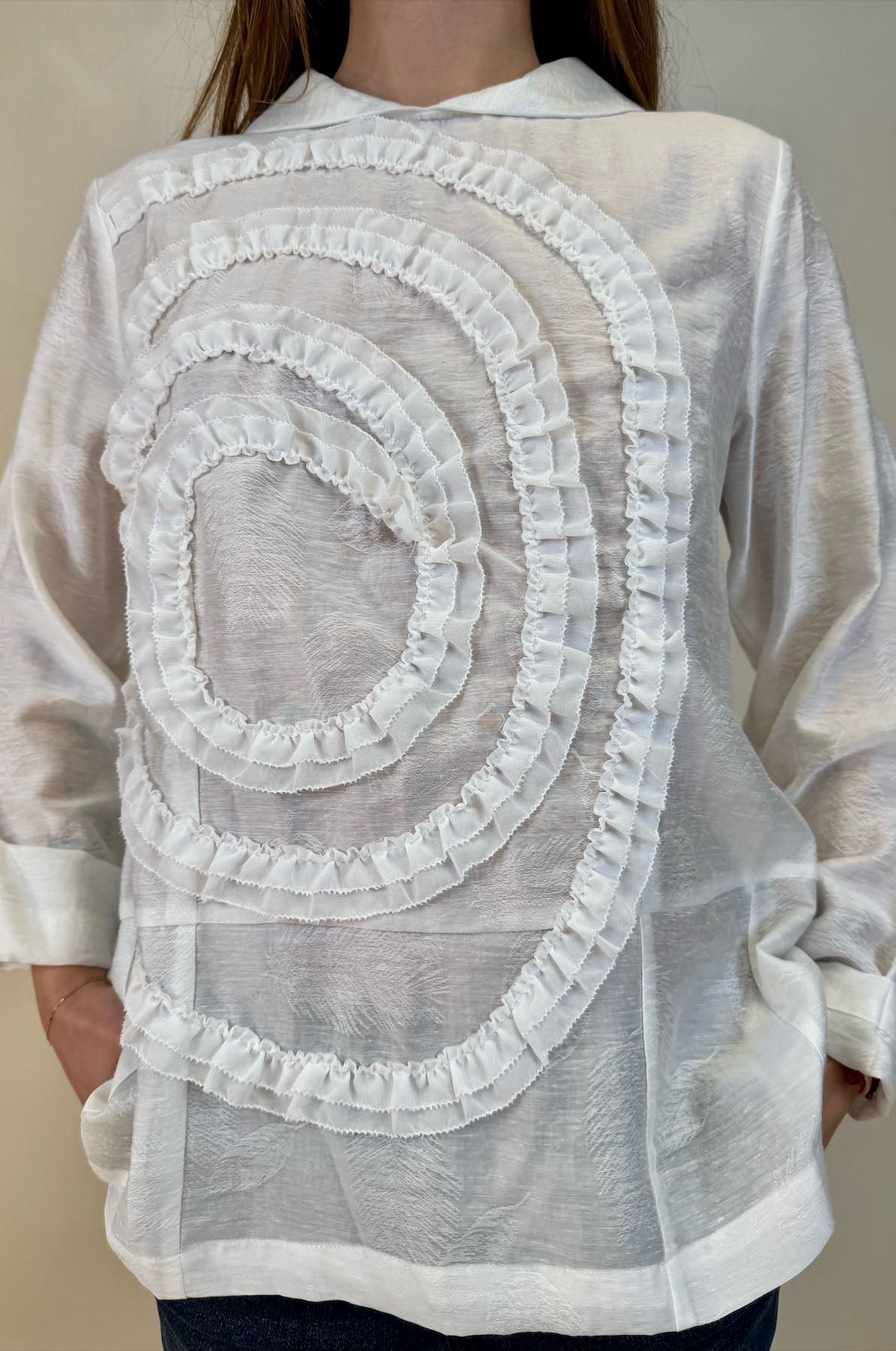 Blusa con motivo applicato