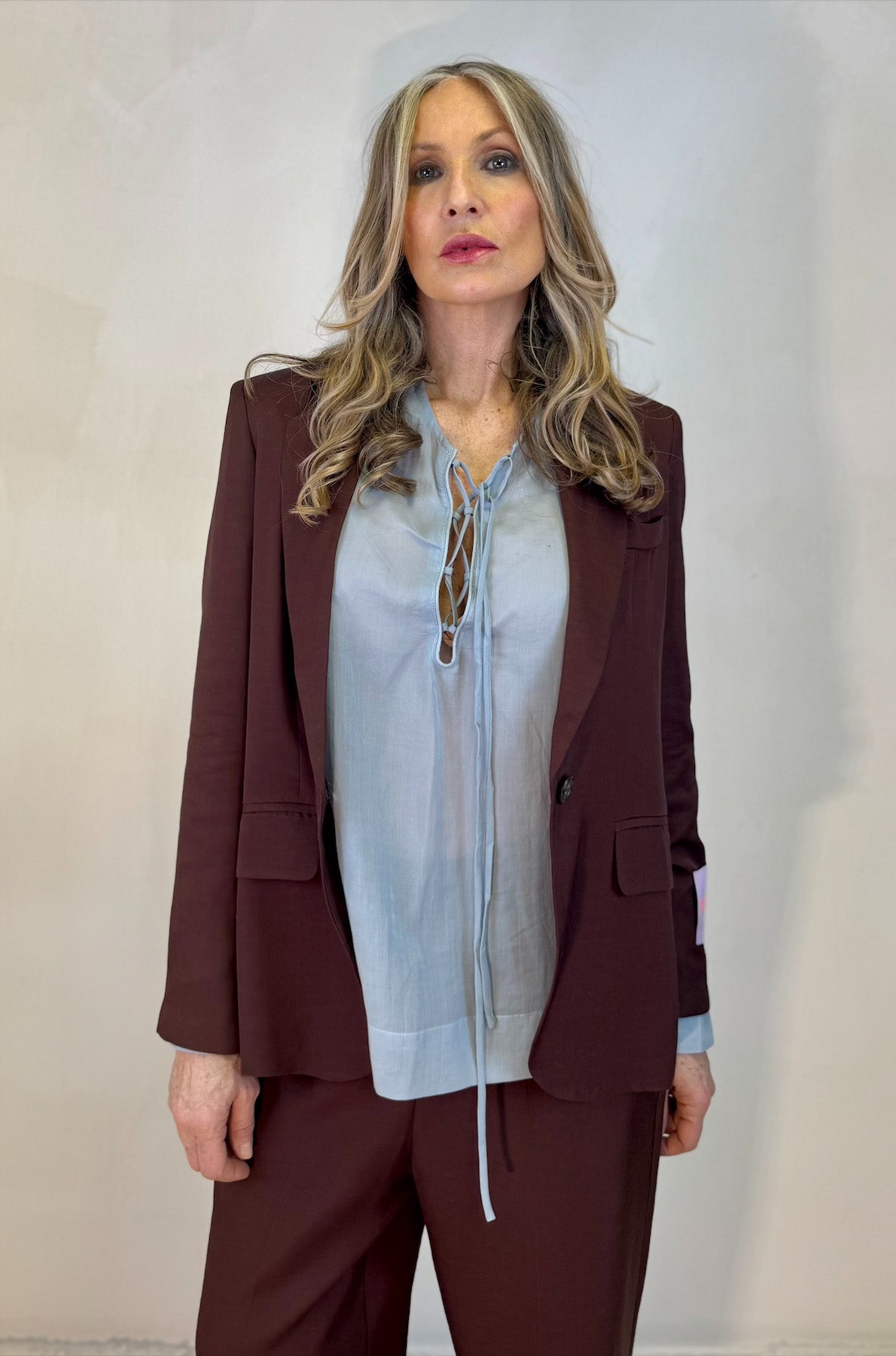 Blusa a V con nastrino