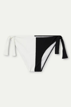 Slip bikini bicolore nero con fiocco