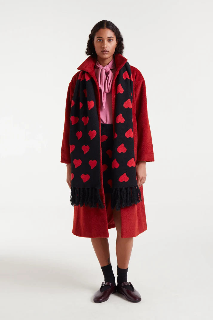 Sciarpa in maglia jacquard stampata con piccolo attacco di cuore