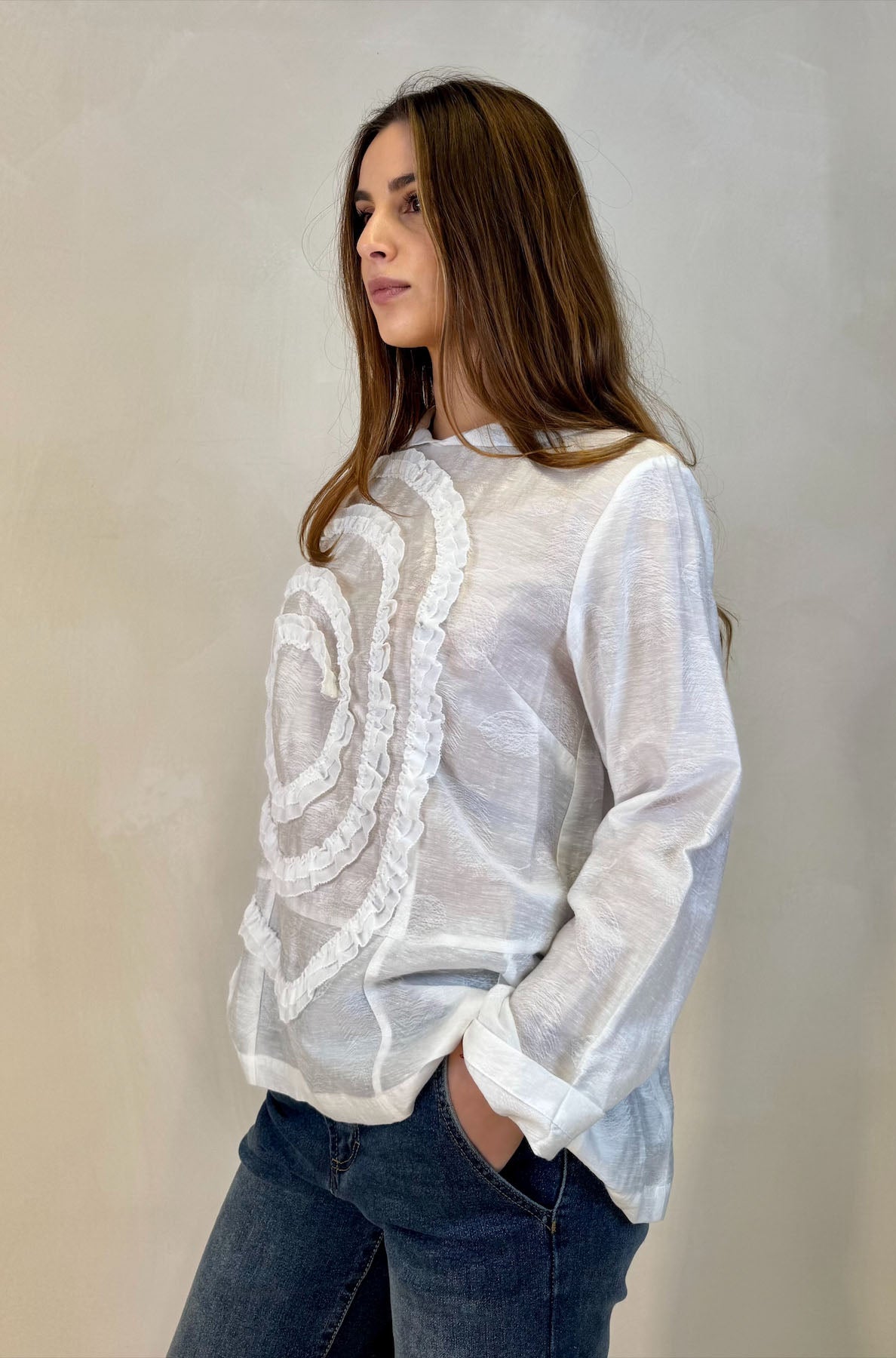 Blusa con motivo applicato