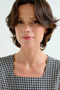 Abito midi a quadretti neri